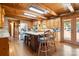 Spacious kitchen with wood cabinets, a center island with seating, and stainless steel appliances at 1620 London Rd, Mooresville, NC 28115