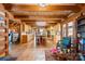 Open kitchen and living area featuring wood beams, cabinetry, and a center island at 1620 London Rd, Mooresville, NC 28115