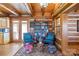 Cozy reading nook with bookshelves, comfortable seating, and natural light at 1620 London Rd, Mooresville, NC 28115