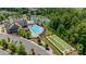 A bird's eye view showing pool, clubhouse, tennis court and bocce ball amenities at 17436 Langston Dr, Charlotte, NC 28278