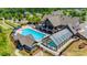 Aerial view of a stunning community pool, clubhouse, and spa amenities at 17436 Langston Dr, Charlotte, NC 28278