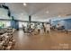 Well-equipped fitness center with various machines, weights, and a mirrored wall at 17436 Langston Dr, Charlotte, NC 28278