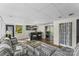 Finished basement room with modern wet bar and sliding glass doors to outside at 2052 10Th Street Nw Pl, Hickory, NC 28601