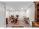 Finished basement with home office setup and warm wood-look floors at 2052 10Th Street Nw Pl, Hickory, NC 28601