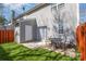 Enclosed backyard featuring artificial grass, a patio, and privacy fence at 2249 Cigar Ct, Charlotte, NC 28273