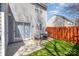 Enclosed backyard featuring artificial grass, a patio, and privacy fence at 2249 Cigar Ct, Charlotte, NC 28273