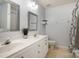 Traditional bathroom featuring double sinks with updated fixtures, and a shower-tub combo at 2249 Cigar Ct, Charlotte, NC 28273