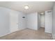 Cozy bedroom with neutral paint, plush carpeting, ample closet space and natural light at 2249 Cigar Ct, Charlotte, NC 28273
