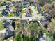 This aerial view showcases a well-maintained neighborhood with lush green lawns and mature trees at 3119 18Th Ne St, Hickory, NC 28601