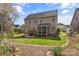 Well-maintained home exterior with a spacious backyard, featuring a screened porch and lush greenery at 3119 18Th Ne St, Hickory, NC 28601