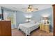 Bright bedroom with natural light, white bedspread and furniture, creating a peaceful atmosphere at 3119 18Th Ne St, Hickory, NC 28601