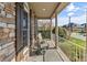 Covered front porch featuring outdoor seating and views of the street and neighborhood at 3119 18Th Ne St, Hickory, NC 28601