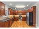 Beautiful kitchen featuring wood cabinets, stainless steel appliances, and tile backsplash at 3119 18Th Ne St, Hickory, NC 28601