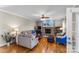 Inviting living room with stone fireplace, hardwood floors, and neutral color palette at 3119 18Th Ne St, Hickory, NC 28601