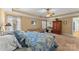 Large main bedroom with a tray ceiling, natural light, and cozy seating area at 3119 18Th Ne St, Hickory, NC 28601