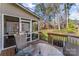 Outdoor patio featuring a glass top table, perfect for enjoying the serene backyard view at 3119 18Th Ne St, Hickory, NC 28601