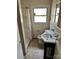 Tiled bathroom featuring a vanity and a shower-tub combo at 314 N Little Texas Rd, Kannapolis, NC 28083