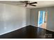 Living room with dark wood floors and ceiling fan at 314 N Little Texas Rd, Kannapolis, NC 28083