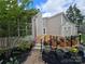 View of the home's backyard, wood deck, and storage shed showing outdoor living and storage at 319 Vista Grande Cir, Charlotte, NC 28226