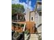 Backyard view with a wooden deck, storage shed, offering ample space for outdoor enjoyment at 319 Vista Grande Cir, Charlotte, NC 28226