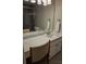 Bright bathroom vanity and sink area with white countertops and a large mirror at 319 Vista Grande Cir, Charlotte, NC 28226