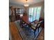 Dining room featuring a chandelier, shutters on the window, and hard wood flooring at 319 Vista Grande Cir, Charlotte, NC 28226