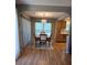 Cozy dining room with a wooden table set, decorative rug, and elegant light fixture at 319 Vista Grande Cir, Charlotte, NC 28226