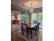 Cozy dining room next to screened porch featuring a sliding glass door and natural light at 319 Vista Grande Cir, Charlotte, NC 28226