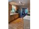 Bright kitchen featuring stainless steel appliances, wood cabinets, and a view into the adjacent dining area at 319 Vista Grande Cir, Charlotte, NC 28226