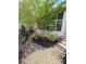 The landscaped yard features flowering plants and shrubs enhancing the home's outdoor appeal at 319 Vista Grande Cir, Charlotte, NC 28226