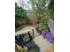 The landscaped yard features a stone path and flowering plants, creating a serene and inviting outdoor space at 319 Vista Grande Cir, Charlotte, NC 28226
