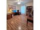 Spacious office featuring wooden desks, shelving, and ample storage, perfect for a productive work environment at 319 Vista Grande Cir, Charlotte, NC 28226