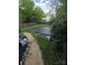 Spacious backyard featuring a covered swimming pool, blending relaxation and recreation at 319 Vista Grande Cir, Charlotte, NC 28226