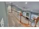 Inviting foyer showcases hardwood floors, open staircase and lots of natural light at 3865 Granite St, Terrell, NC 28682