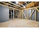 Unfinished basement with open rafters and cement floors at 4009 Grace Pointe Dr # 101, Indian Trail, NC 28079
