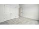 Bedroom features neutral carpet, great natural light and a walk in closet at 4009 Grace Pointe Dr # 101, Indian Trail, NC 28079