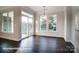 Bright dining area with large windows and sliding glass door to the outdoors at 4009 Grace Pointe Dr # 101, Indian Trail, NC 28079