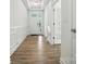 Bright entryway with light wood flooring, white walls, and a view of the front door at 4009 Grace Pointe Dr # 101, Indian Trail, NC 28079