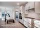 Modern kitchen featuring granite countertops, stainless steel appliances, and white cabinetry at 4009 Grace Pointe Dr # 101, Indian Trail, NC 28079
