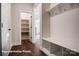 Mudroom with coat hooks, bench seating, and storage cubbies perfect for organization at 4009 Grace Pointe Dr # 101, Indian Trail, NC 28079