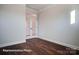 Study with natural light, french doors and dark hardwood flooring at 4009 Grace Pointe Dr # 101, Indian Trail, NC 28079