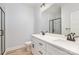 Modern bathroom featuring a double vanity and a black framed shower at 402 Walker St, Kannapolis, NC 28081