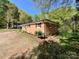 Brick home with black shutters and manicured landscaping at 418 Dallas Stanley Hwy, Dallas, NC 28034