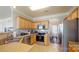 Bright kitchen with stainless steel appliances and a view to the dining room at 504 Galesburg Dr, Monroe, NC 28110