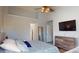 Spacious main bedroom featuring a comfortable bed, tv, and ample closet space at 504 Galesburg Dr, Monroe, NC 28110