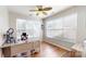 Well-lit office space with natural light from large windows and hardwood floors at 504 Galesburg Dr, Monroe, NC 28110