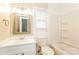 Bright bathroom with a vanity, toilet, and a shower-tub combo at 570 Scaleybark Rd, Rock Hill, SC 29732