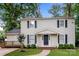 Charming two-story home featuring classic architectural details and a well-manicured lawn at 570 Scaleybark Rd, Rock Hill, SC 29732