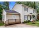 Side view of a two-story house with wooden deck, lawn and trees at 570 Scaleybark Rd, Rock Hill, SC 29732