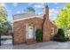 Charming brick house featuring a welcoming front door at 6117 Brace Rd, Charlotte, NC 28211